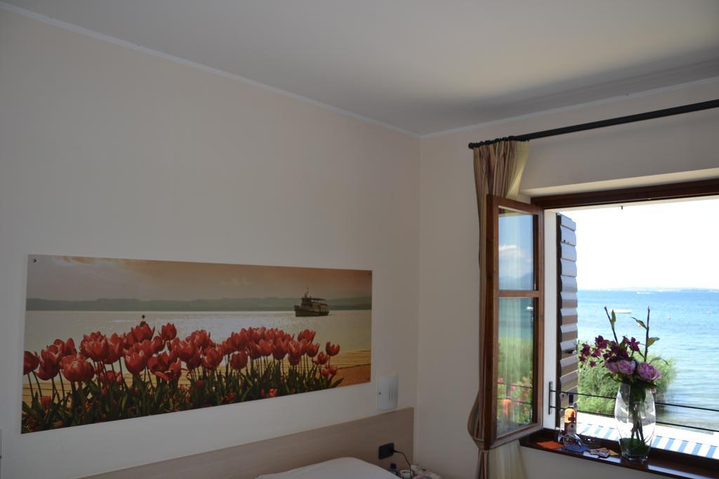 Locanda Le Palafitte Bardolino Habitación foto